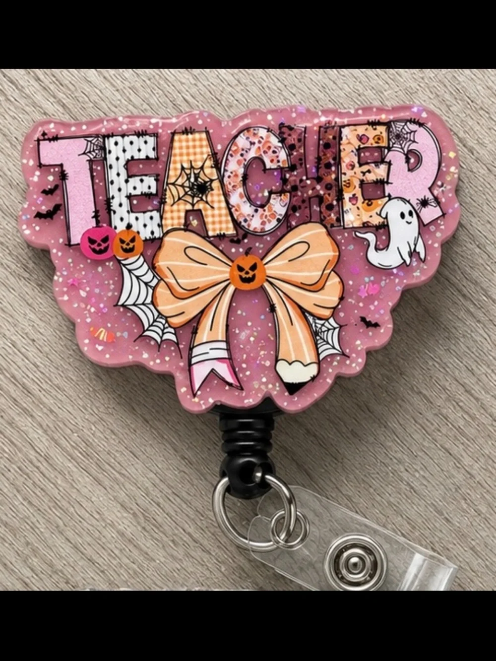 Pink 'Teacher' Halloween Badge Reel with Bow
